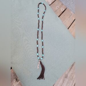 Long Wood Bead Necklace w/ Suede Fringe & Metal Feather Pendant